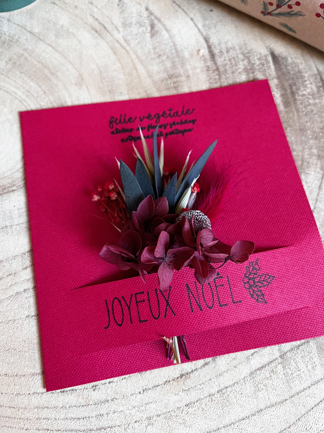 Carte "JOYEUX NOËL" avec bouquet de fleurs séchées